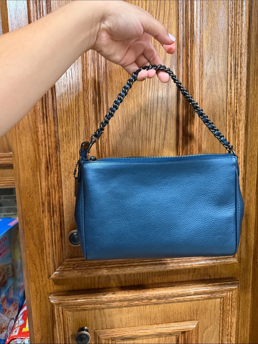 Coach EUC Pebbled Carrie Leather crossbody metallic blue
